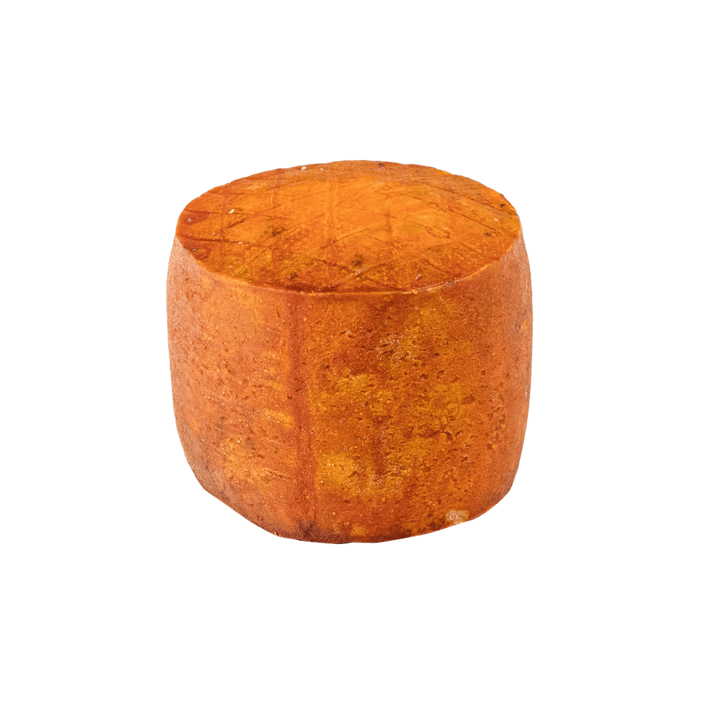 Queso pequeño de leche cruda de oveja pinzelada con Pimiento de Ezpeleta