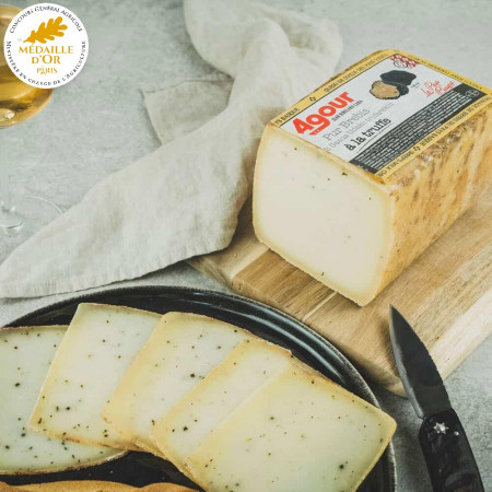 Brick of sheep cheese with...